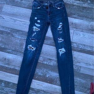 dark washed American Eagle size 00 regular fitted jeans